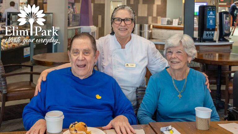 Father John with friends at Elim Park